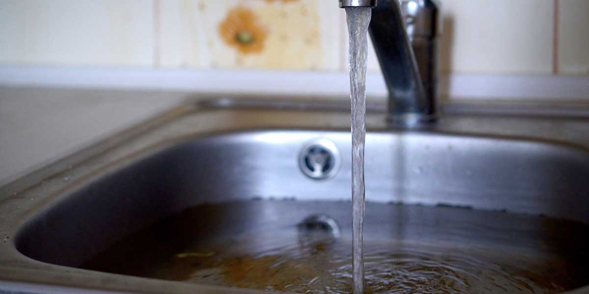 water backing up in kitchen sink